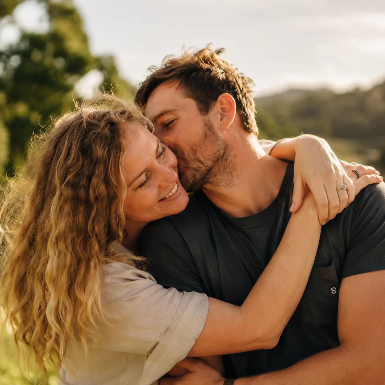 Young Australian couple kissing